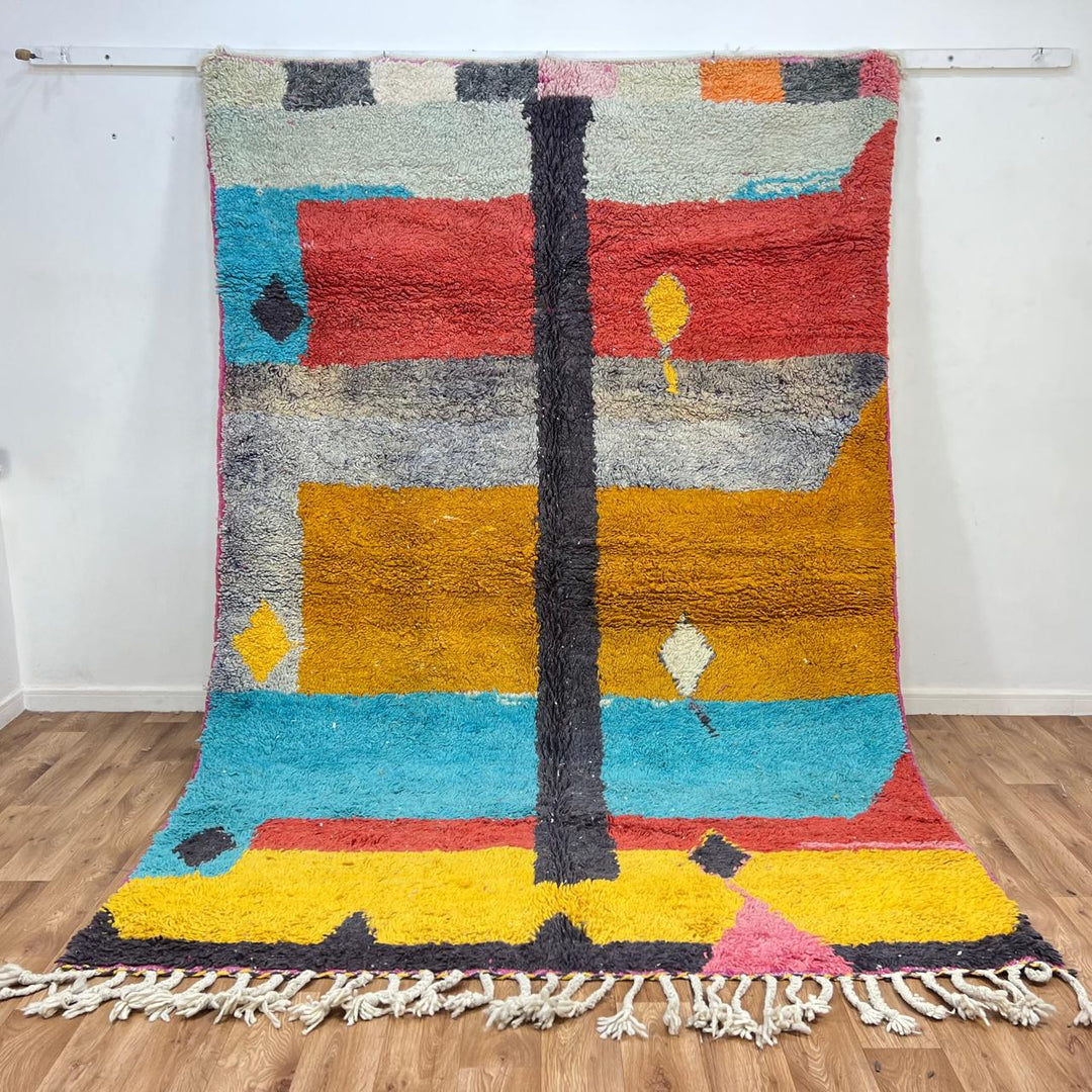Vintage Moroccan wool rug 824 – handmade Berber carpet with yellow, blue, red, and gray abstract patterns, medium pile (299 × 200 cm / 9.81 × 6.56 ft).