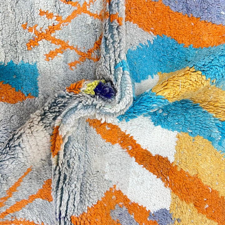 Vintage Moroccan wool rug 782 – cream and colorful handmade Berber carpet with geometric orange, turquoise, and grey patterns, 271 × 170 cm (8.89 × 5.57 ft).