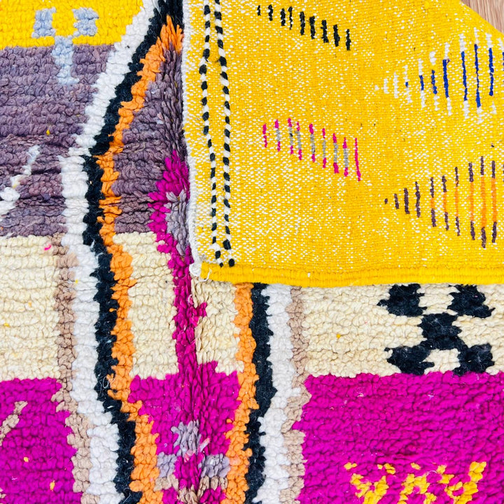 Vintage Moroccan wool rug with colorful Berber geometric symbols, handmade in Morocco