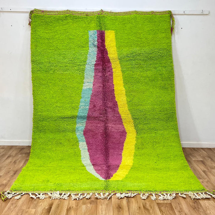 Vintage Moroccan wool rug 877 – handmade Berber carpet with lime green base and pink-yellow abstract stripe, 299 × 206 cm (9.81 × 6.75 ft).