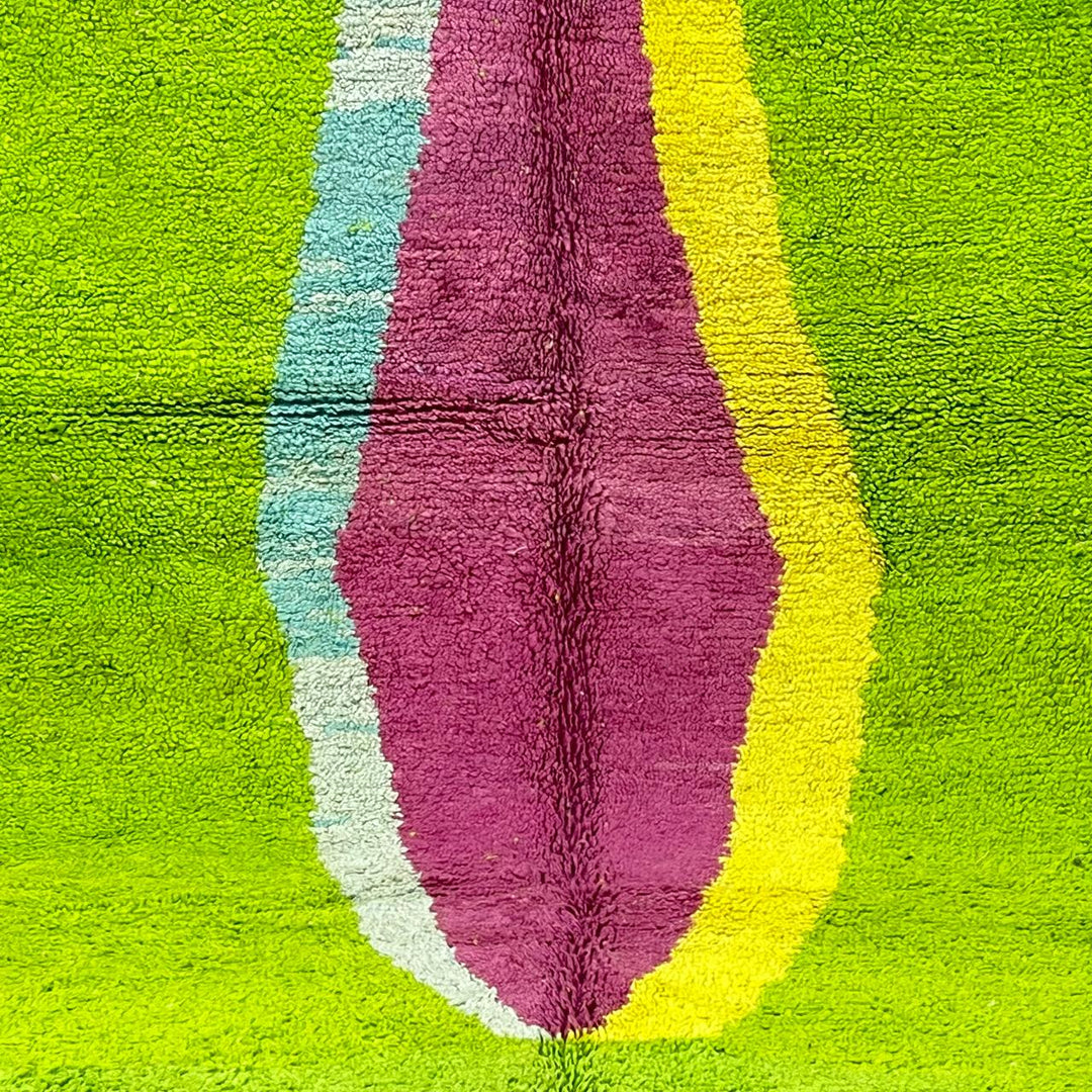 Vintage Moroccan wool rug 877 – handmade Berber carpet with lime green base and pink-yellow abstract stripe, 299 × 206 cm (9.81 × 6.75 ft).