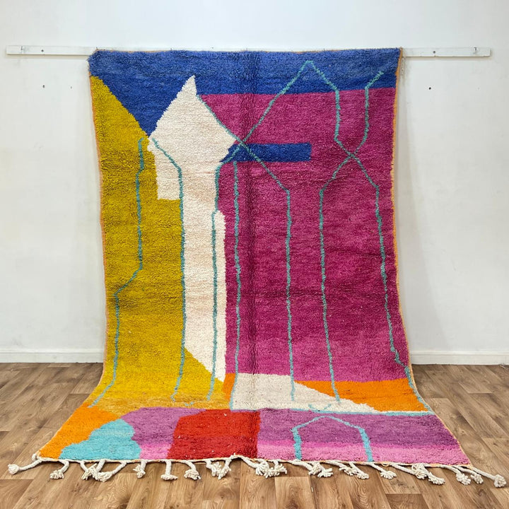 Vintage Moroccan wool rug 844 – handmade Berber carpet with geometric color blocks in fuchsia, yellow, blue, orange, and cream. 305 × 187 cm (10.00 × 6.13 ft).