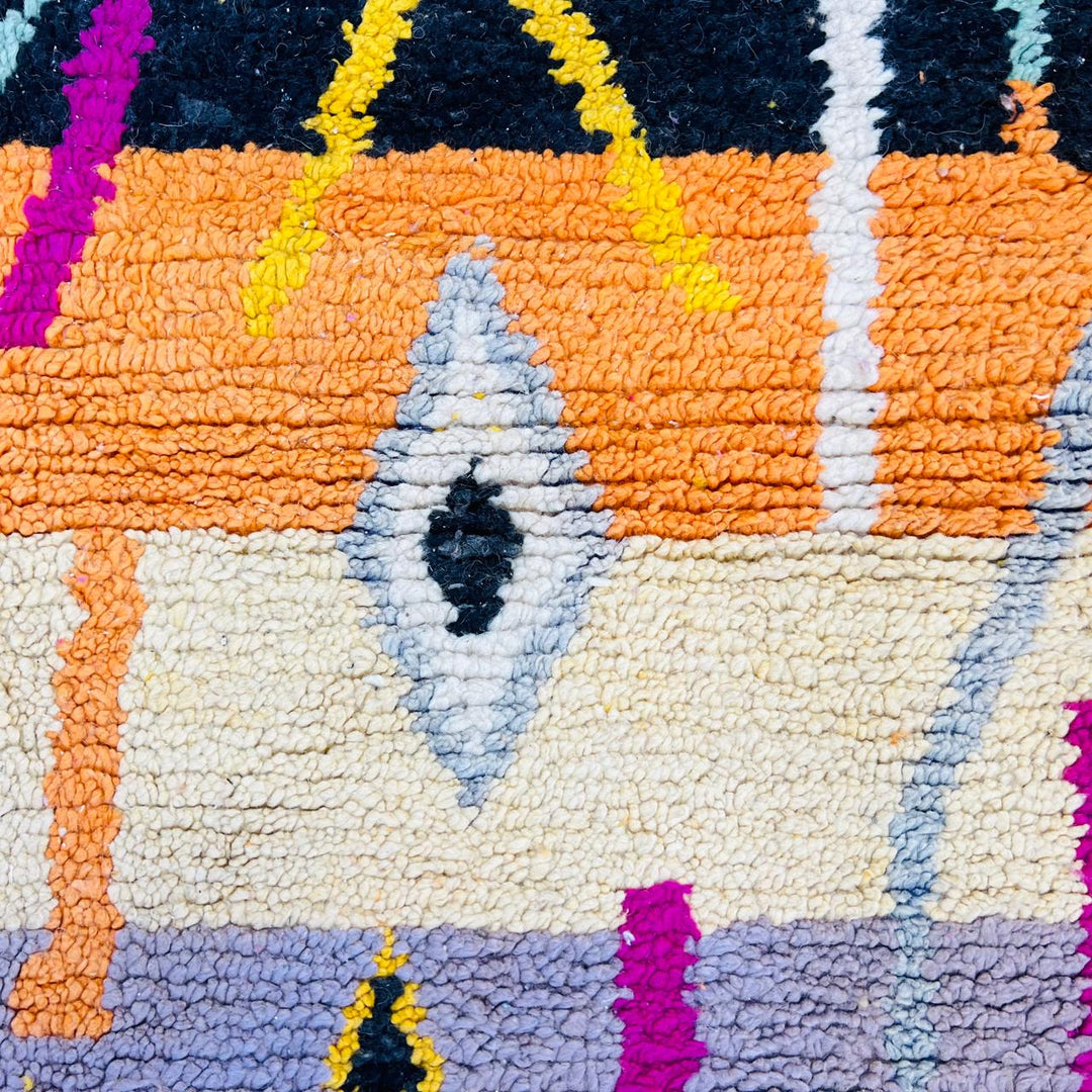 Vintage Moroccan wool rug with colorful Berber geometric symbols, handmade in Morocco