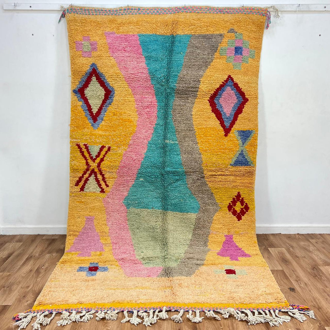 Vintage Moroccan wool rug 763 – handmade colorful Berber carpet with yellow, turquoise, pink, and red geometric diamond patterns (283 × 162 cm / 9.28 × 5.31 ft).