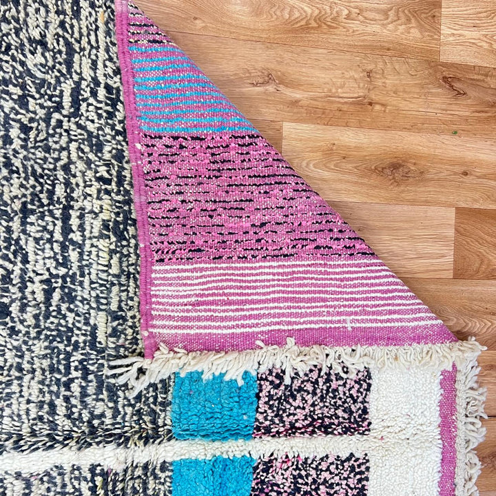 Vintage Moroccan wool rug 204 – handmade blue, cream, and pink geometric abstract Berber design (268 × 156 cm).