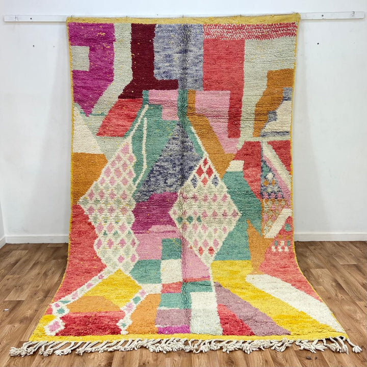 Vintage Moroccan wool rug 831 – handmade Berber carpet with colorful geometric abstract patterns, 305 × 187 cm (10.00 × 6.13 ft).