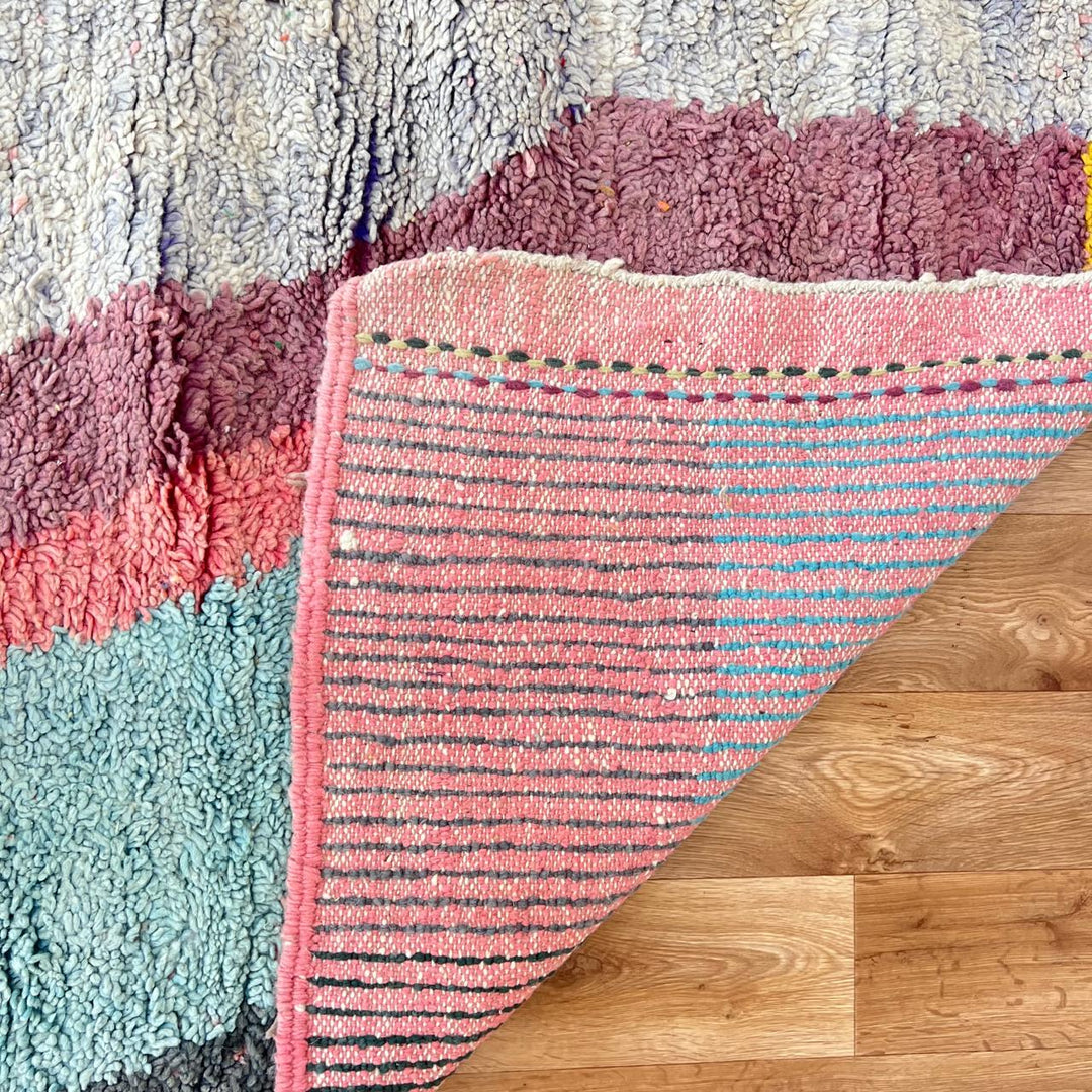 Vintage Moroccan wool rug 875 – handmade colorful Berber carpet with geometric shapes in pink, yellow, and turquoise (300 × 198 cm / 9.84 × 6.5 ft).