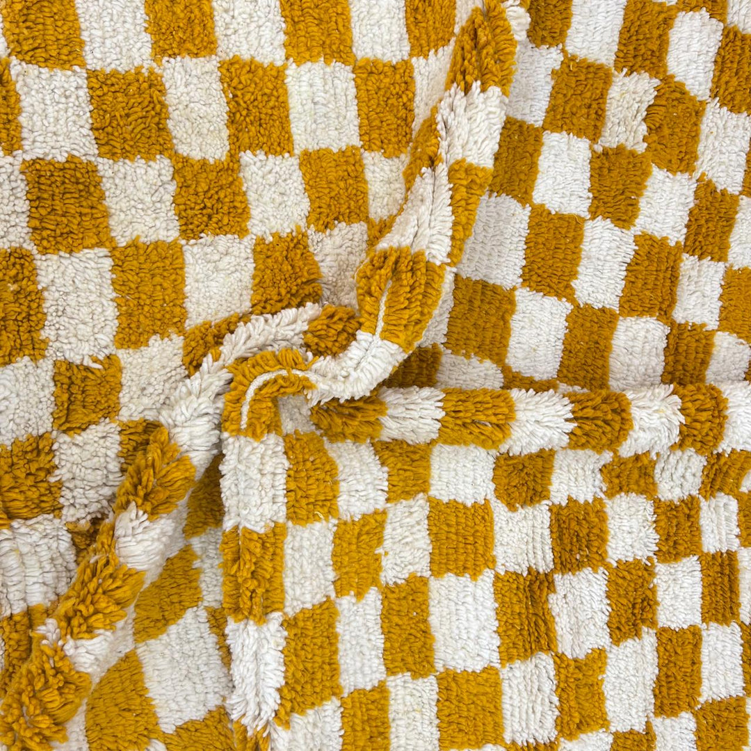 Vintage Moroccan Wool Rug 133 – handmade mustard and cream checkerboard Moroccan wool rug (240 × 172 cm).