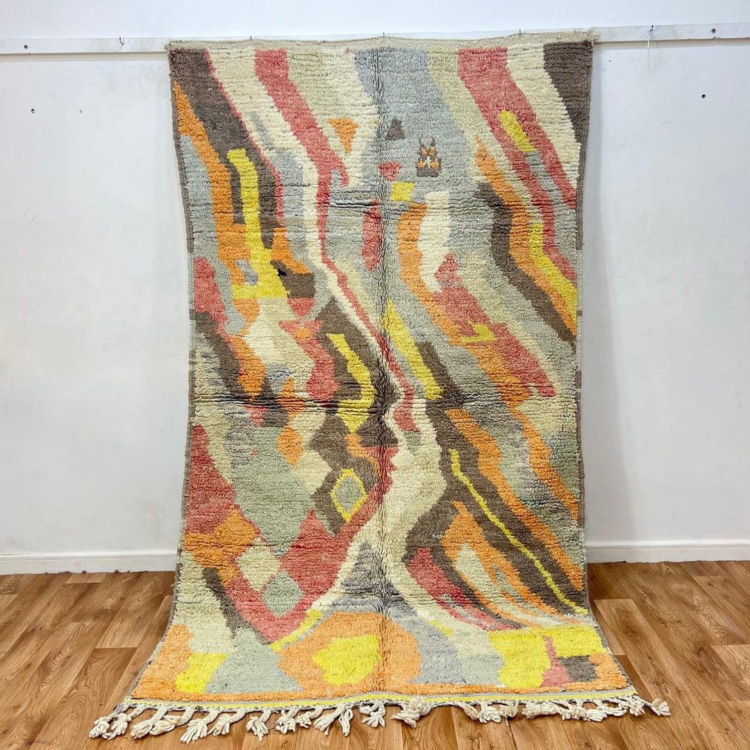 Vintage Moroccan wool rug 396 – handmade abstract earth tone design with yellow, coral, and beige pattern (256 × 148 cm).