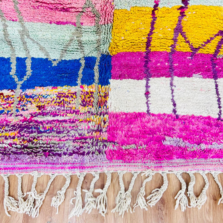 Vintage Moroccan Berber wool rug with colorful geometric patchwork pattern