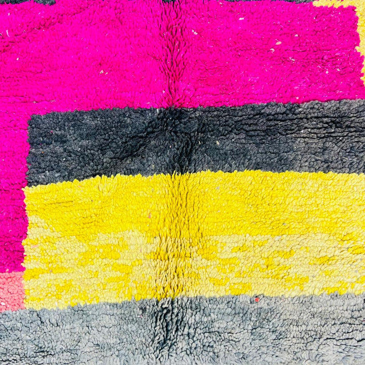 Vintage Moroccan wool rug with pink yellow and charcoal geometric pattern, handwoven Berber carpet from Morocco