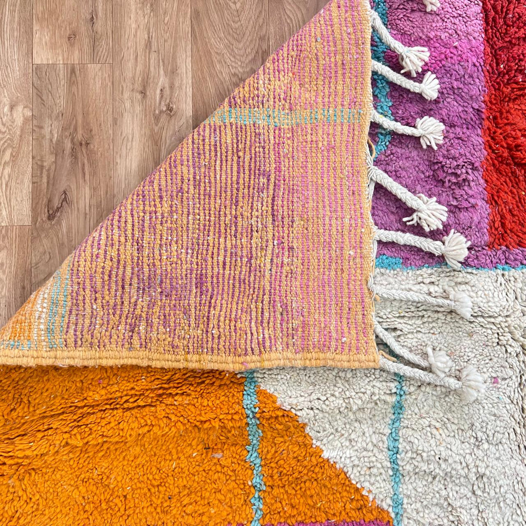 Vintage Moroccan wool rug 844 – handmade Berber carpet with geometric color blocks in fuchsia, yellow, blue, orange, and cream. 305 × 187 cm (10.00 × 6.13 ft).