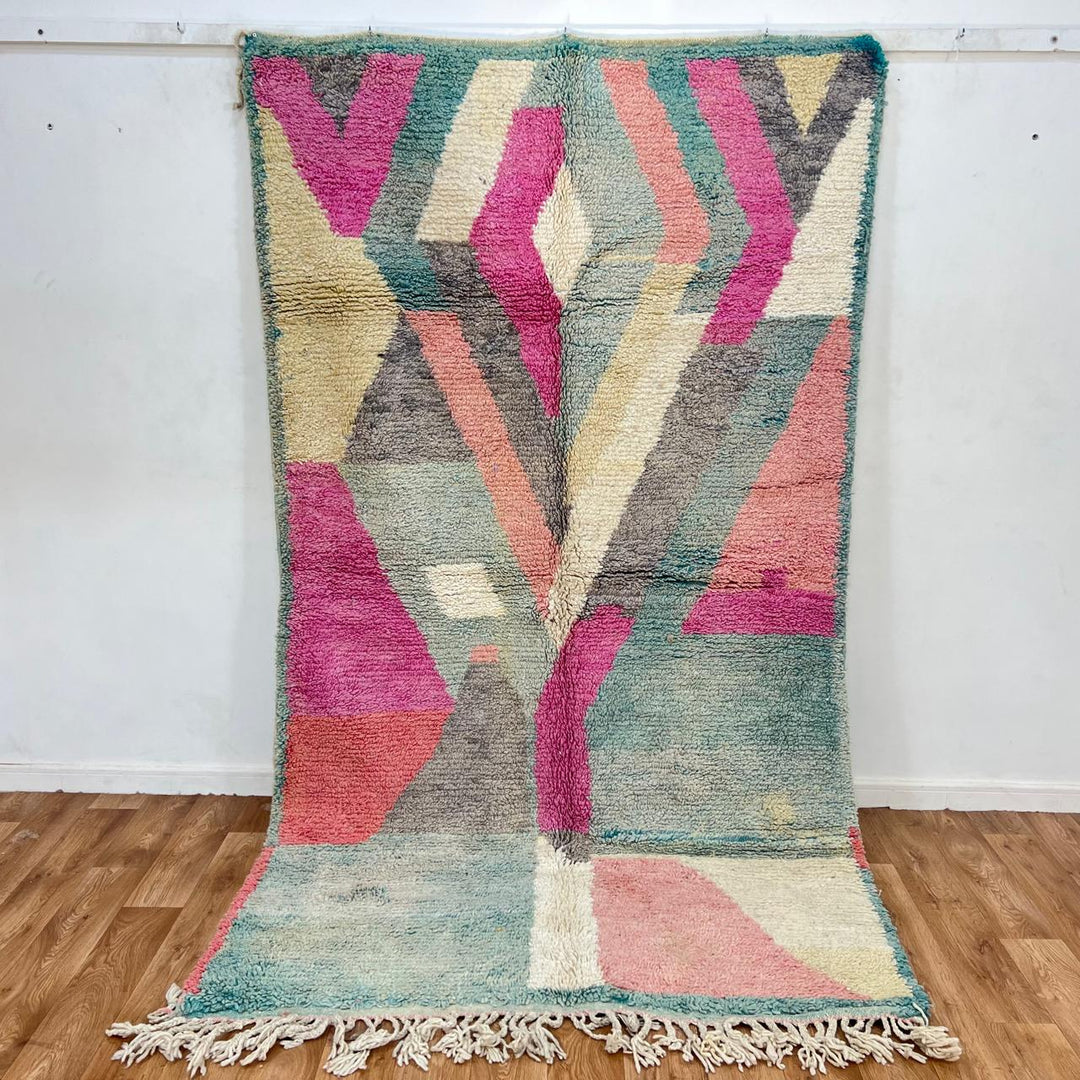 Vintage Moroccan Wool Rug 182 – handmade geometric pastel Moroccan rug in pink, teal, and beige tones (268 × 149 cm).