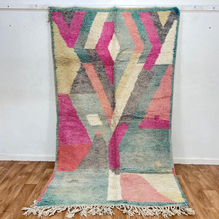 Vintage Moroccan Wool Rug 182 – handmade geometric pastel Moroccan rug in pink, teal, and beige tones (268 × 149 cm).