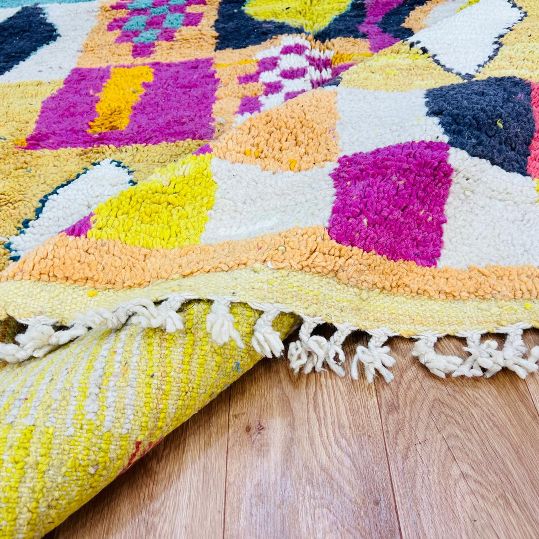 Vintage Moroccan wool rug with colorful Berber geometric grid pattern in yellow, pink, turquoise and ivory, handmade in Morocco, 251x164 cm