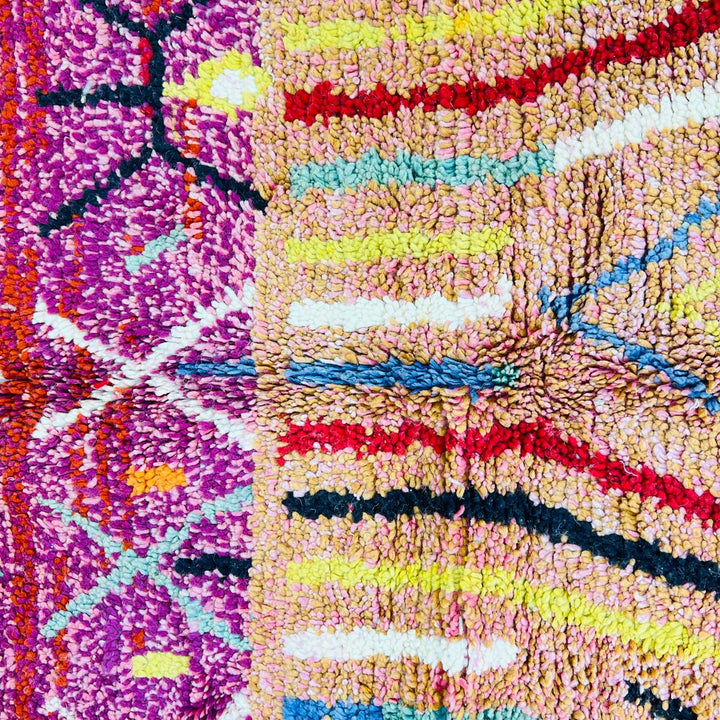 Vintage Moroccan wool rug with red base, colorful Berber diamond patterns, handmade tribal carpet