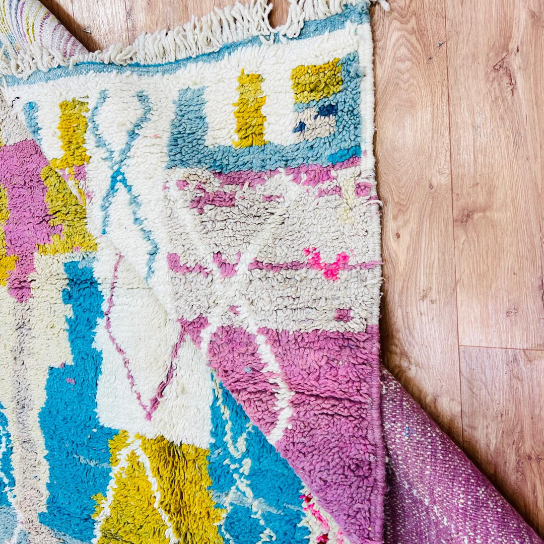 Vintage Moroccan wool rug with pastel geometric Berber pattern in pink, blue and beige