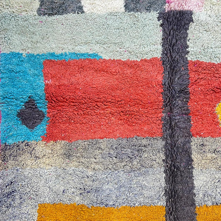 Vintage Moroccan wool rug 824 – handmade Berber carpet with yellow, blue, red, and gray abstract patterns, medium pile (299 × 200 cm / 9.81 × 6.56 ft).
