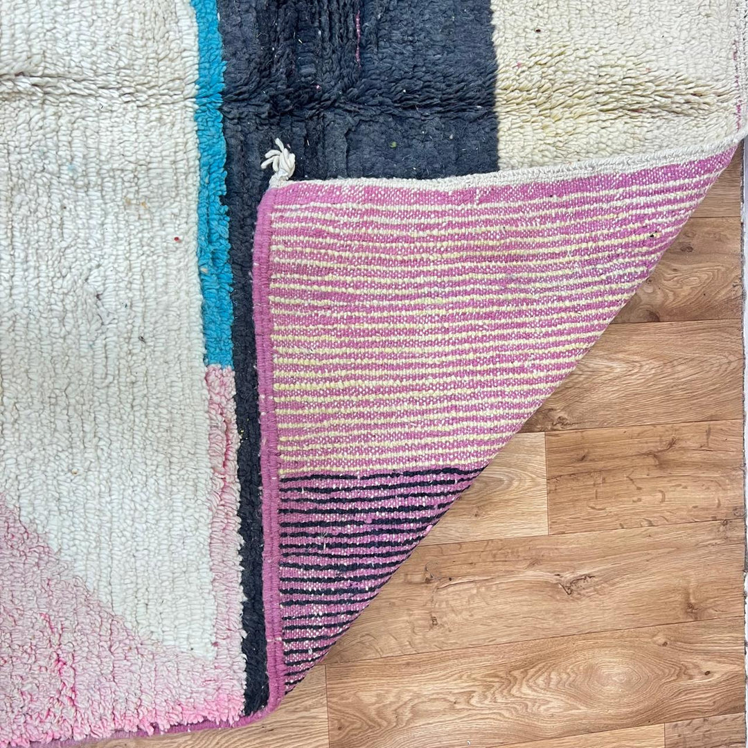 Vintage Moroccan wool rug 204 – handmade blue, cream, and pink geometric abstract Berber design (268 × 156 cm).