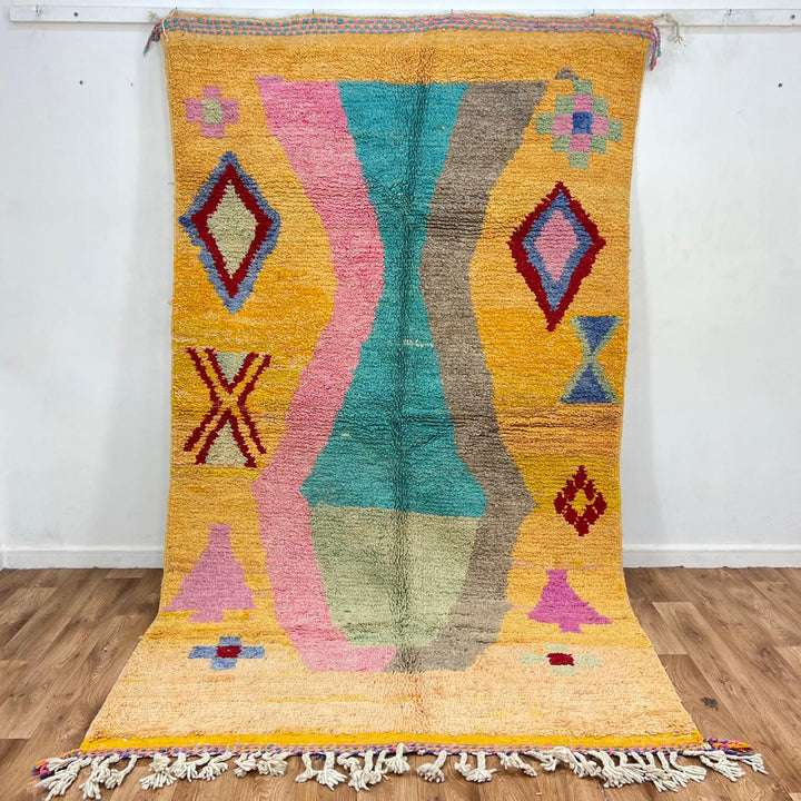 Vintage Moroccan wool rug 763 – handmade colorful Berber carpet with yellow, turquoise, pink, and red geometric diamond patterns (283 × 162 cm / 9.28 × 5.31 ft).