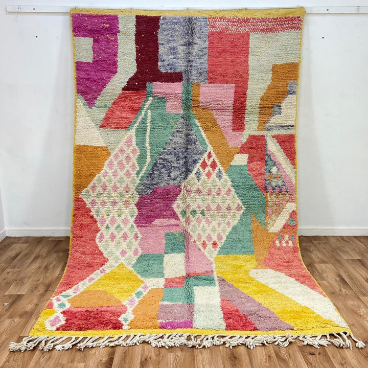 Vintage Moroccan wool rug 831 – handmade Berber carpet with colorful geometric abstract patterns, 305 × 187 cm (10.00 × 6.13 ft).