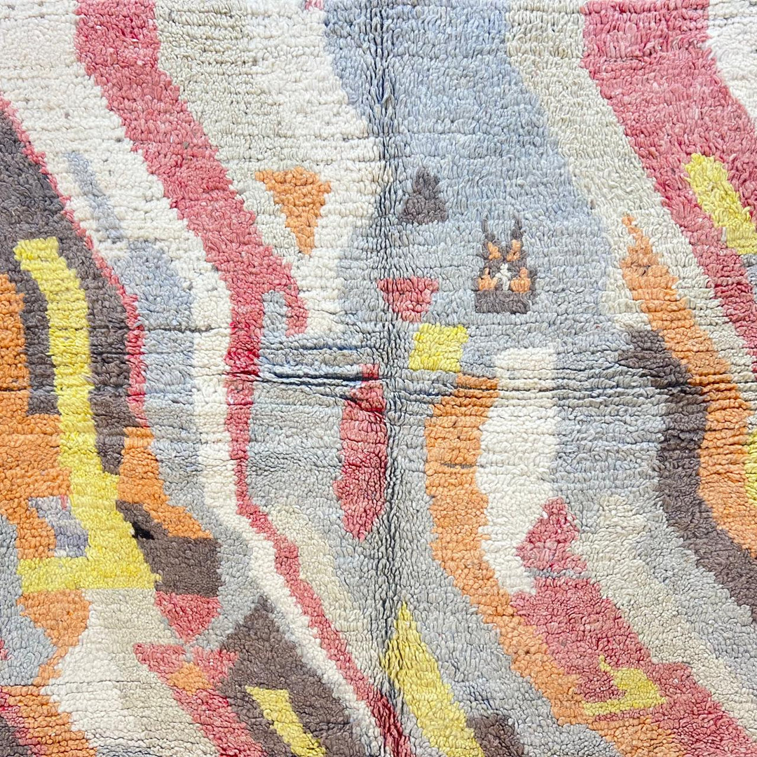 Vintage Moroccan wool rug 396 – handmade abstract earth tone design with yellow, coral, and beige pattern (256 × 148 cm).