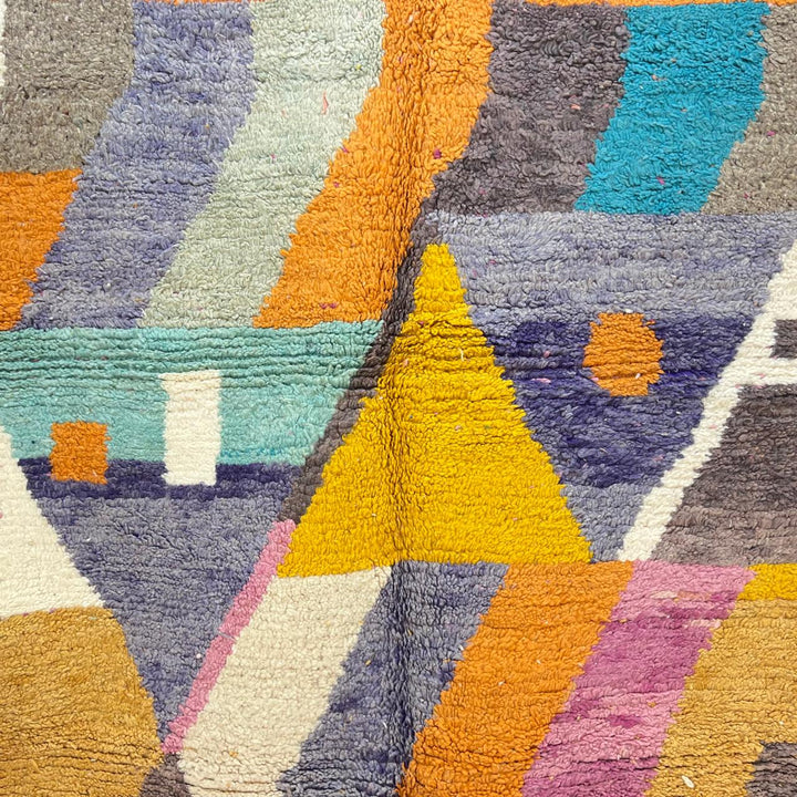 Vintage Moroccan wool rug 257 – handmade Berber rug with vibrant geometric design in orange, yellow, purple, and blue (264 × 162 cm).