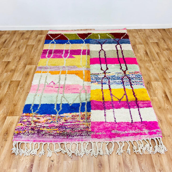 Vintage Moroccan Berber wool rug with colorful geometric patchwork pattern