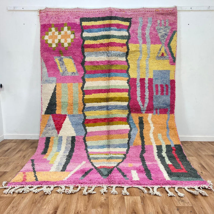 Vintage Moroccan wool rug 840 – handmade pink and yellow Berber carpet with geometric and abstract motifs (295 × 203 cm / 9.68 × 6.66 ft).
