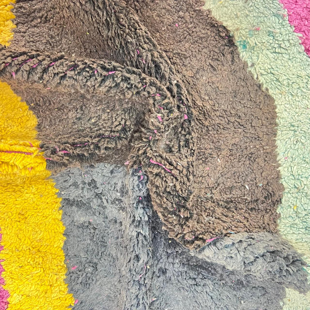 Vintage Moroccan wool rug 827 – handmade Berber carpet with pink, black, yellow and mint abstract shape. 291 × 192 cm (9.54 × 6.30 ft).