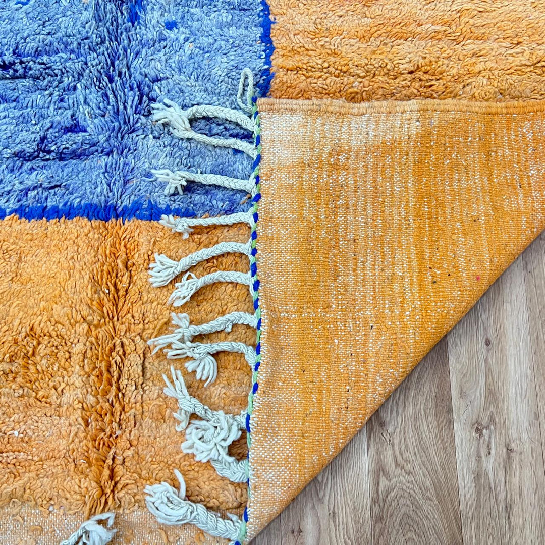 Vintage Moroccan wool rug 826 – handmade Berber carpet with orange, blue, and green geometric abstract design. 308 × 195 cm (10.1 × 6.39 ft).