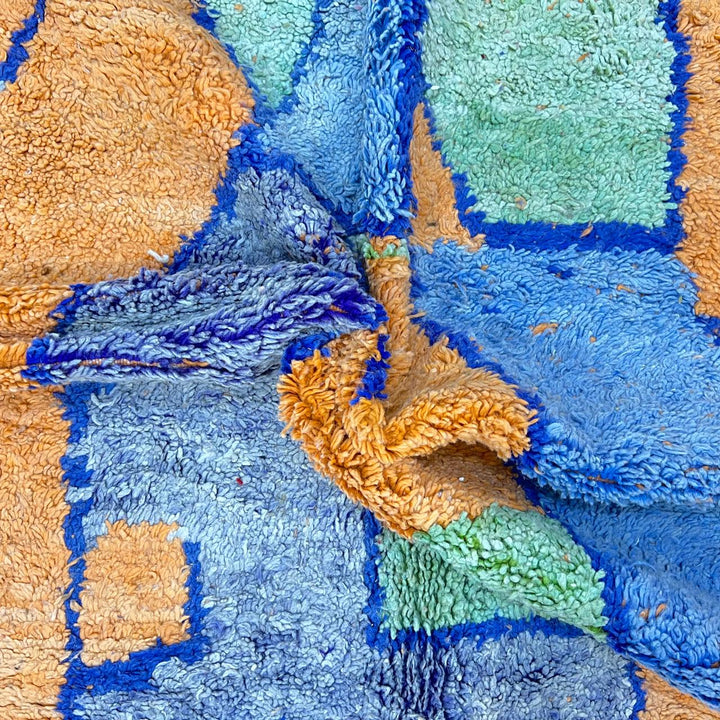 Vintage Moroccan wool rug 826 – handmade Berber carpet with orange, blue, and green geometric abstract design. 308 × 195 cm (10.1 × 6.39 ft).