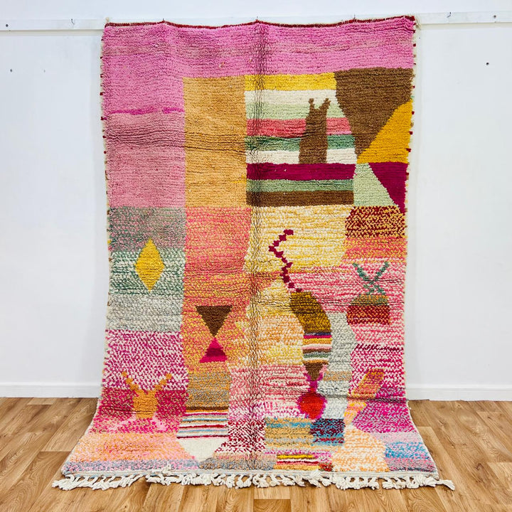 Vintage Moroccan wool rug 684 handmade Berber rug with pink, yellow, and multicolor geometric patterns.
