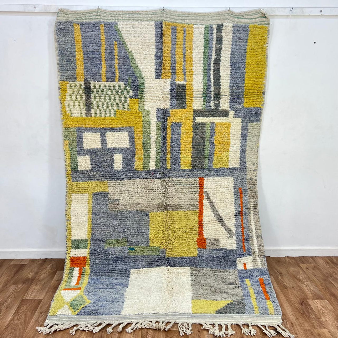 Vintage Moroccan wool rug 746 – handwoven abstract Berber carpet with geometric pattern in gray, yellow, and ivory (251 × 159 cm / 8.23 × 5.21 ft).