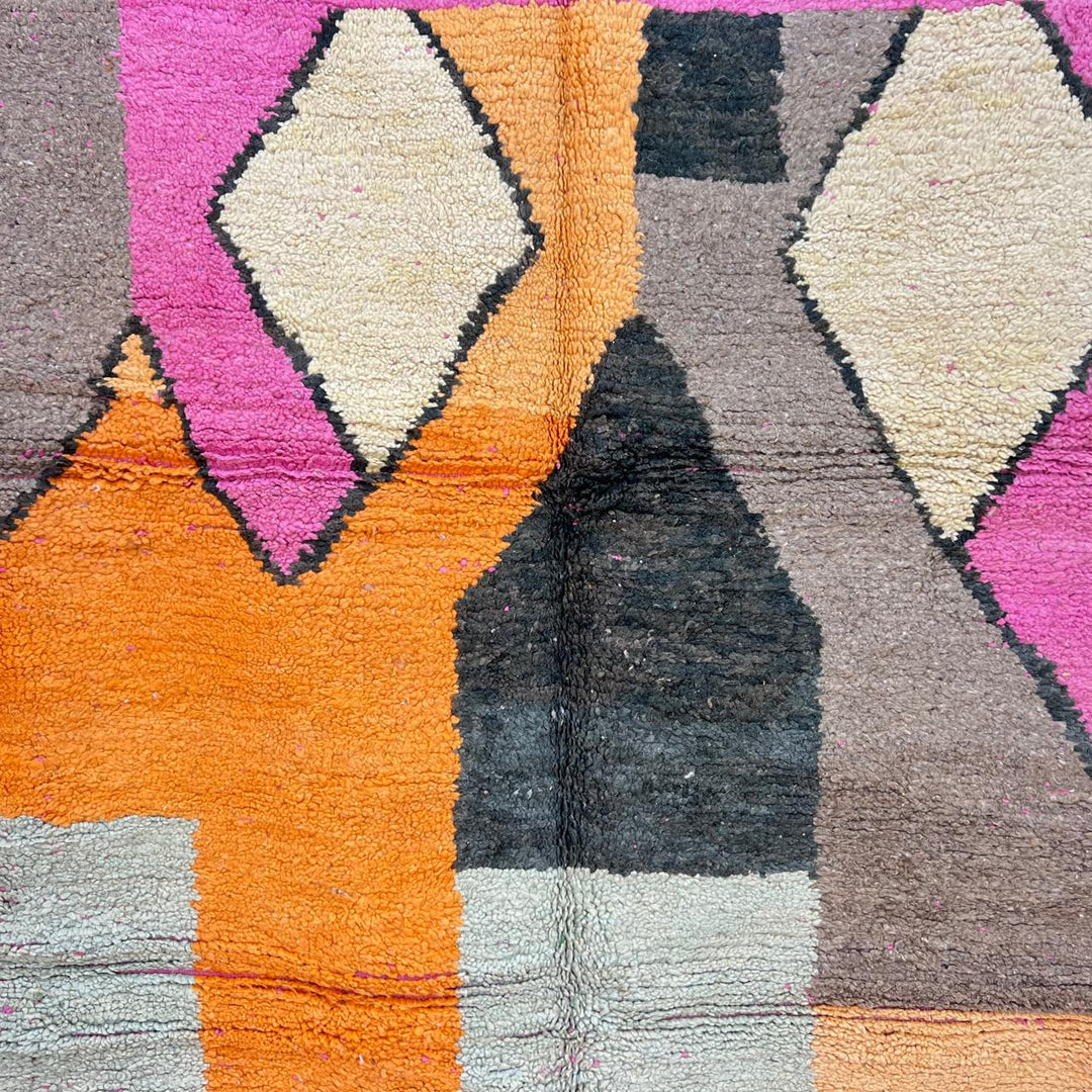 Vintage Moroccan Wool Rug 233 – handmade geometric Berber rug in orange, pink and yellow tones (254 × 154 cm).