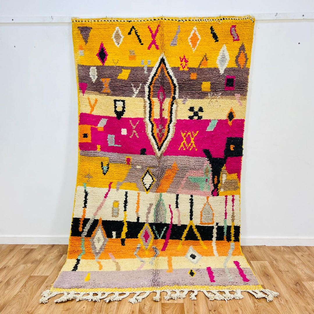 Vintage Moroccan wool rug with colorful Berber geometric symbols, handmade in Morocco