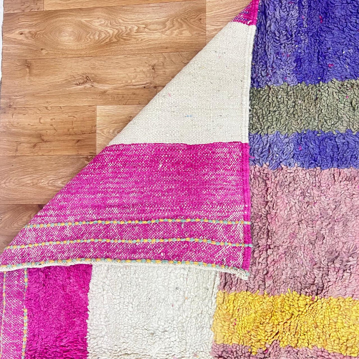 Vintage Moroccan wool rug 843 – handwoven Berber carpet with colorful pink, yellow, green and purple geometric design (316 × 198 cm).