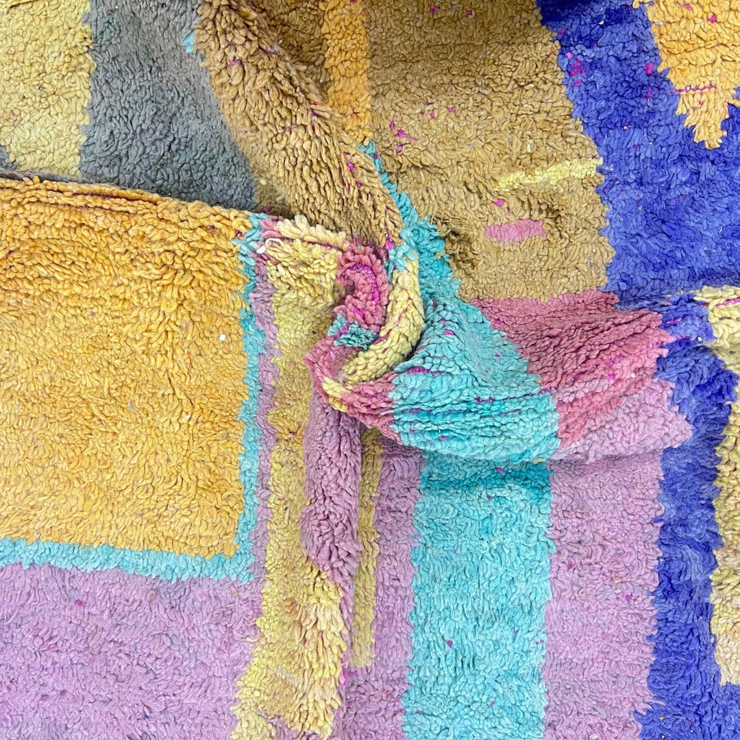 Vintage Moroccan wool rug 843 – handwoven Berber carpet with colorful pink, yellow, green and purple geometric design (316 × 198 cm).