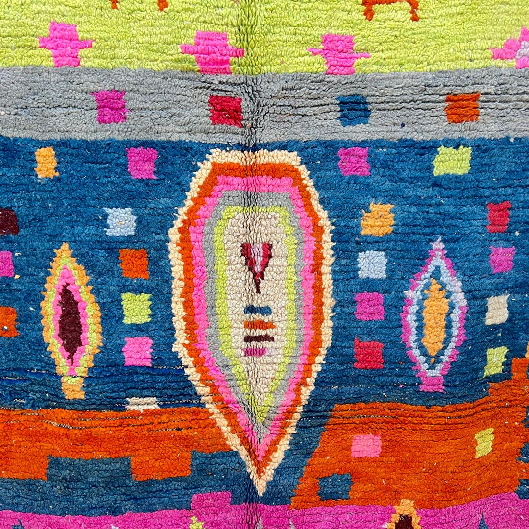 Vintage Moroccan wool rug 138 – handmade colorful geometric Berber design with pink, blue, and orange tones (234 × 162 cm).