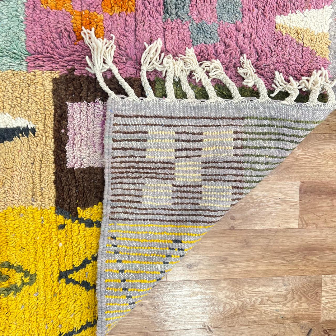 Vintage Moroccan wool rug 250 – handwoven Berber patchwork design in pink, yellow and green tones (254 × 155 cm).