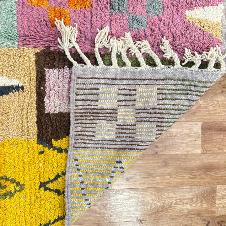 Vintage Moroccan wool rug 250 – handwoven Berber patchwork design in pink, yellow and green tones (254 × 155 cm).