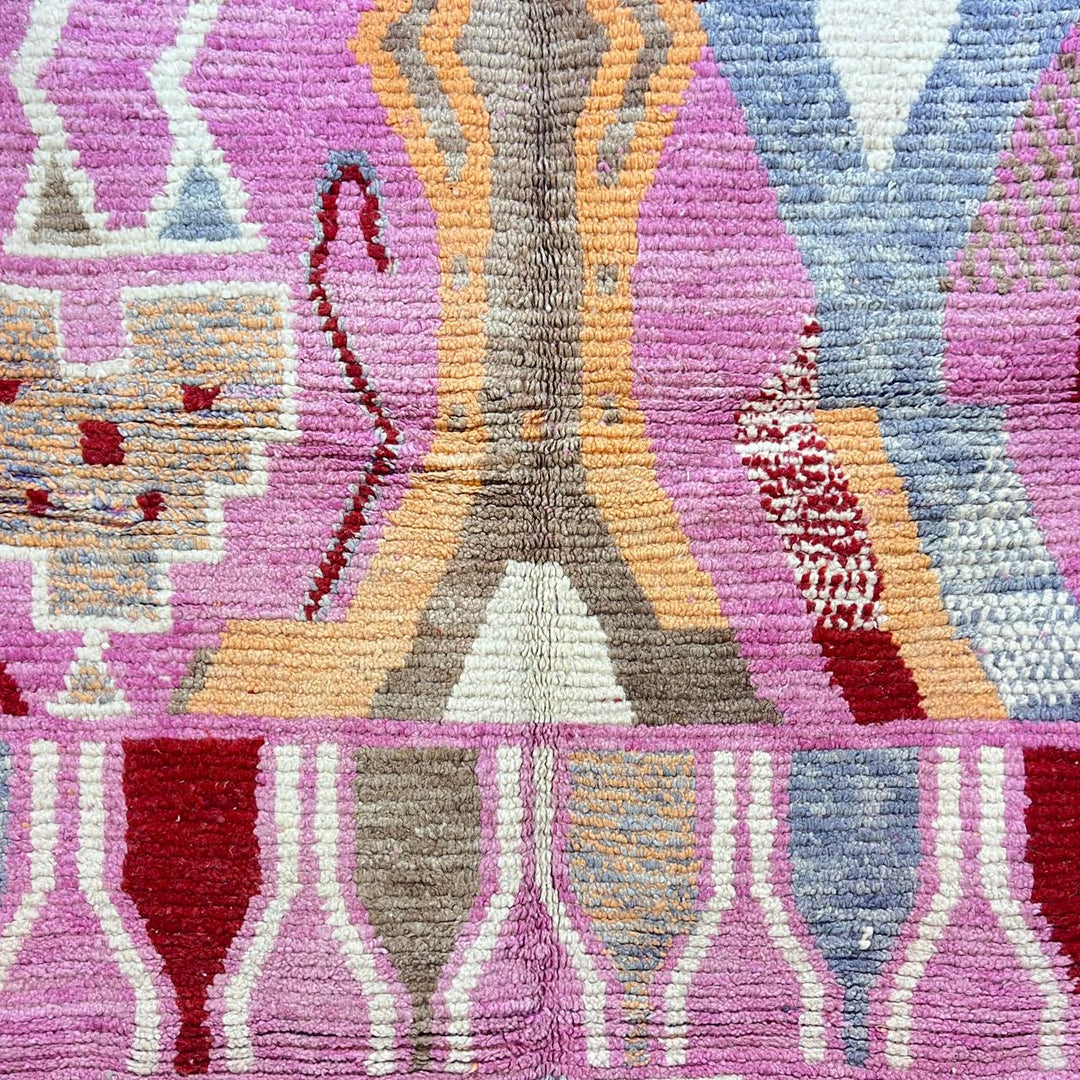 Vintage Moroccan wool rug 776 – colorful handmade Berber carpet with pink, red, and beige geometric patterns, 262 × 168 cm (8.59 × 5.51 ft).