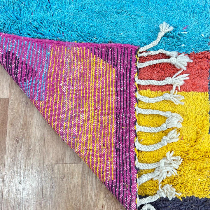 Vintage Moroccan wool rug 824 – handmade Berber carpet with yellow, blue, red, and gray abstract patterns, medium pile (299 × 200 cm / 9.81 × 6.56 ft).