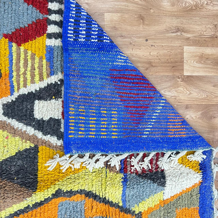 Vintage Moroccan Wool Rug 200 – handmade multicolor geometric Moroccan rug (250 × 170 cm).