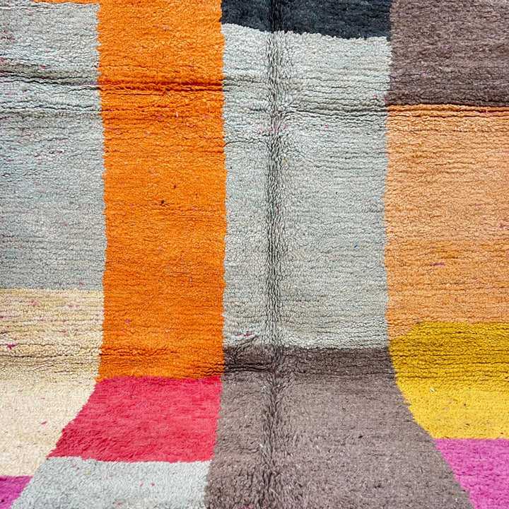 Vintage Moroccan Wool Rug 233 – handmade geometric Berber rug in orange, pink and yellow tones (254 × 154 cm).
