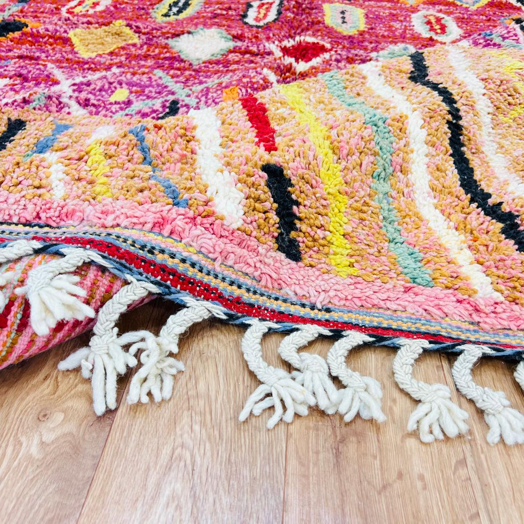 Vintage Moroccan wool rug with red base, colorful Berber diamond patterns, handmade tribal carpet