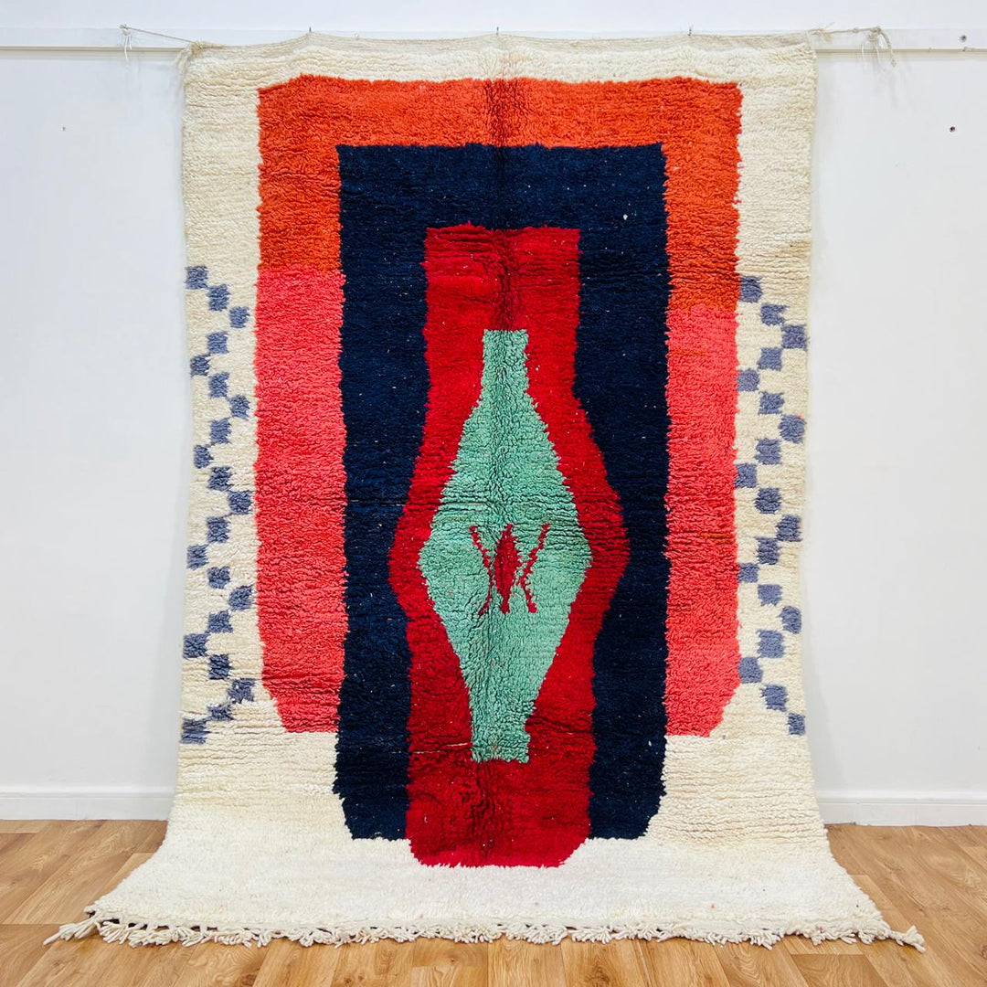 Vintage Moroccan wool rug with bold geometric Berber design in red, navy and mint