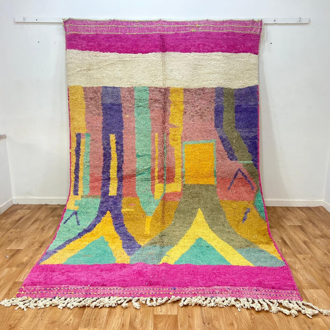 Vintage Moroccan wool rug 843 – handwoven Berber carpet with colorful pink, yellow, green and purple geometric design (316 × 198 cm).