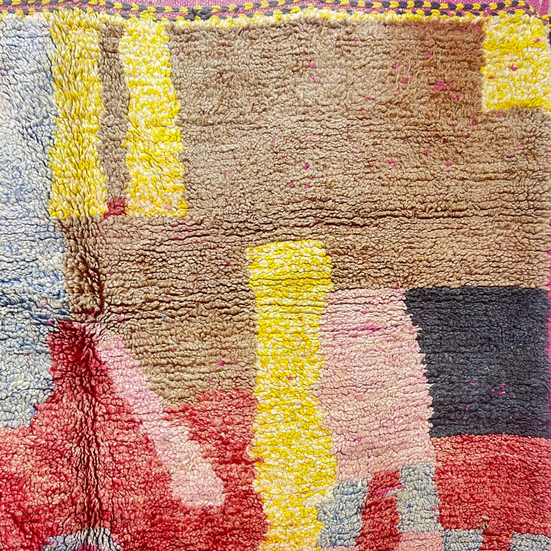 Vintage Moroccan wool rug 916 – handmade Berber rug with colorful abstract design in yellow, pink, and red tones (314 × 200 cm).