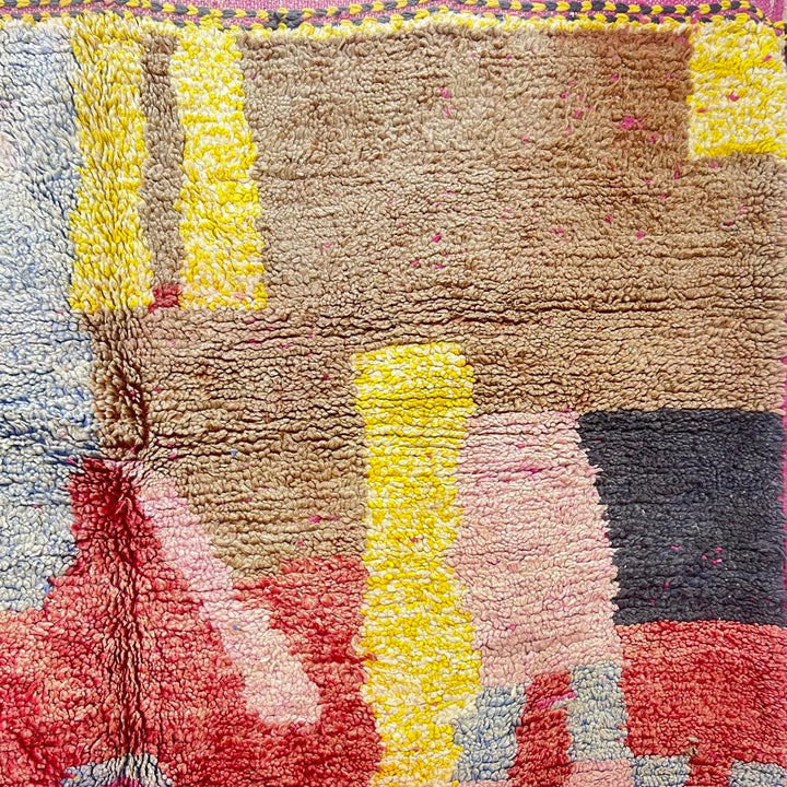 Vintage Moroccan wool rug 916 – handmade Berber rug with colorful abstract design in yellow, pink, and red tones (314 × 200 cm).
